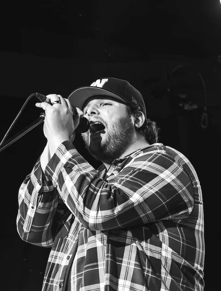 Neon Madmen band member performing live