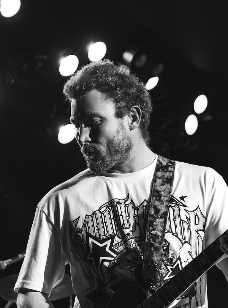 Neon Madmen band member performing live